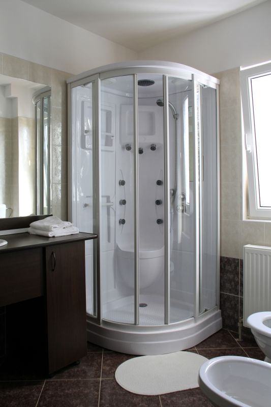 Corner Walk-in Shower with Curved Glass